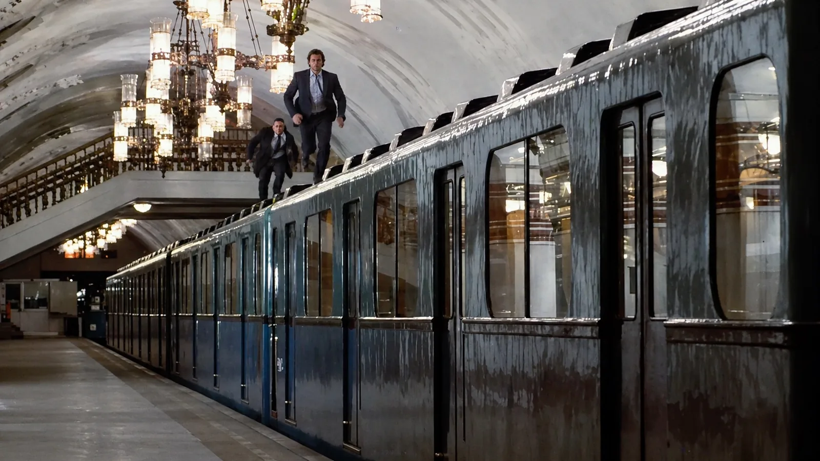Running on the rooftop of a moving train