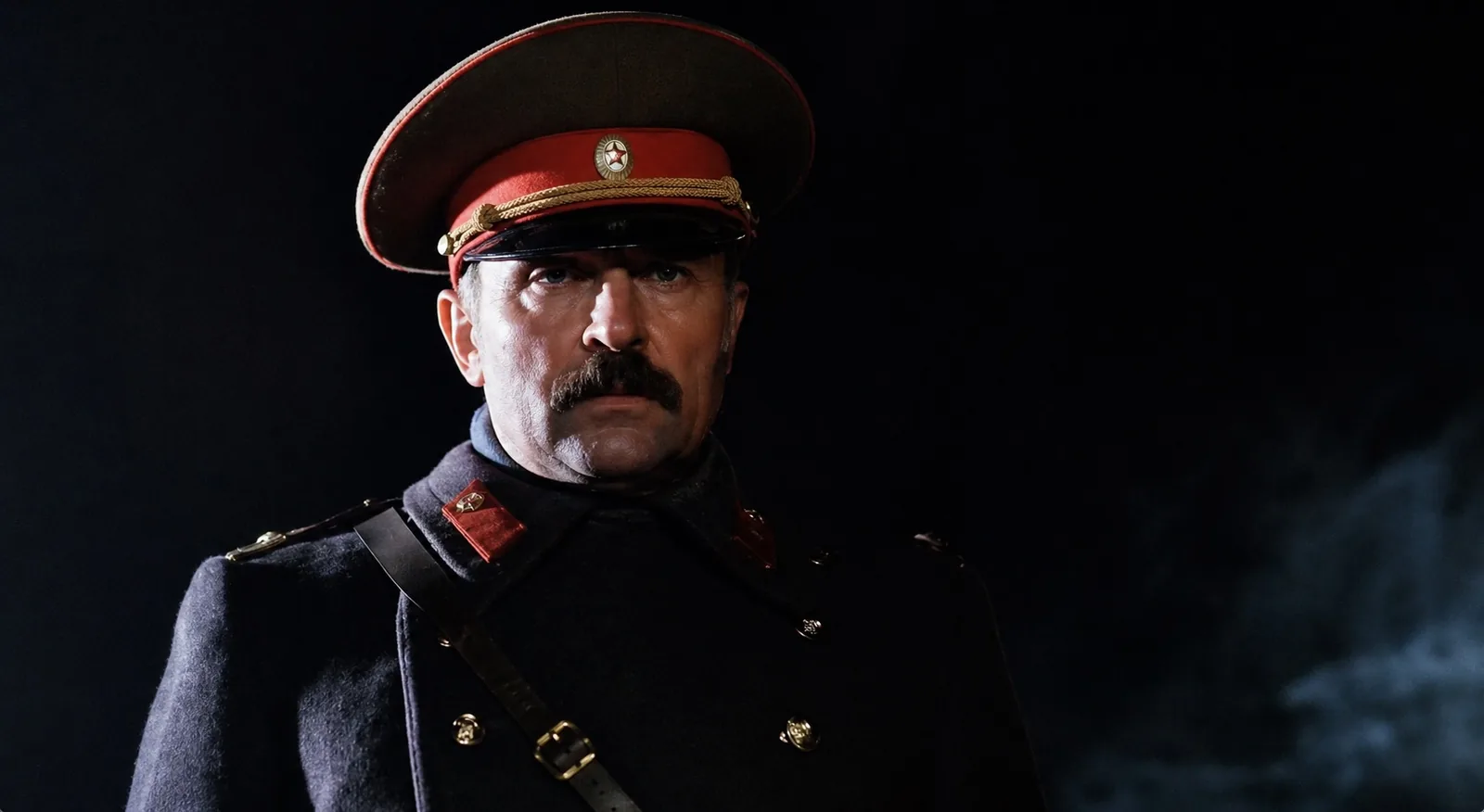 Kolya watching new prisoners arrive at camp